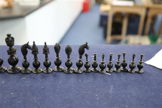 A mid 19th century Anglo Indian turned black stained and natural ivory chess set, kings 3.5in.